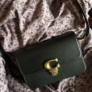 Coach black and Gold Crossbody Bag